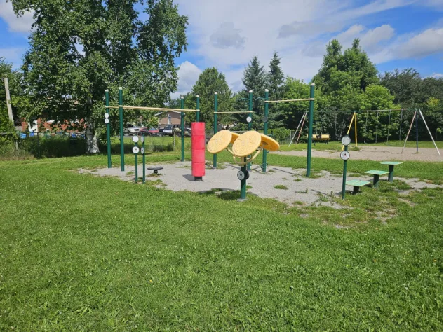 Outdoor exercise equipment at Redfern Tot Lot, Greater Sudbury